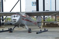 G-APBE @ EGKA - Auster 5 (minus propeller) in what should in the future develop into a hangar at Shoreham airport