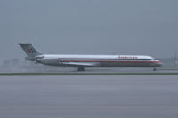 N469AA @ AFW - American Airlines Super80 diverted to Alliance Airport during heavy rains.
