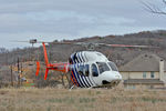 N428CF - CareFlite helicopter departing vacant lot - Kennedale, TX