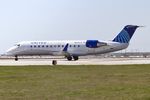N223JS @ KORD - CRJ2 SkyWest/United Express  Bombardier CRJ-200ER  N223JS SKW5519 ORD-CHA, departing 22L ORD - by Mark Kalfas