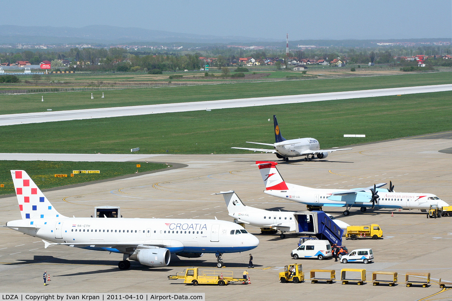 Zagreb Pleso Airport, Zagreb Croatia (LDZA) - Picture shows east side of Zagreb airport platform. Left from DLH Boeing 737 is taxiway C and DLH taxi on taxiway F to the holding point runway 23.