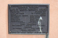 Santa Fe Municipal Airport (SAF) - Santa Fe Municipal  - marker on terminal building - by Zane Adams