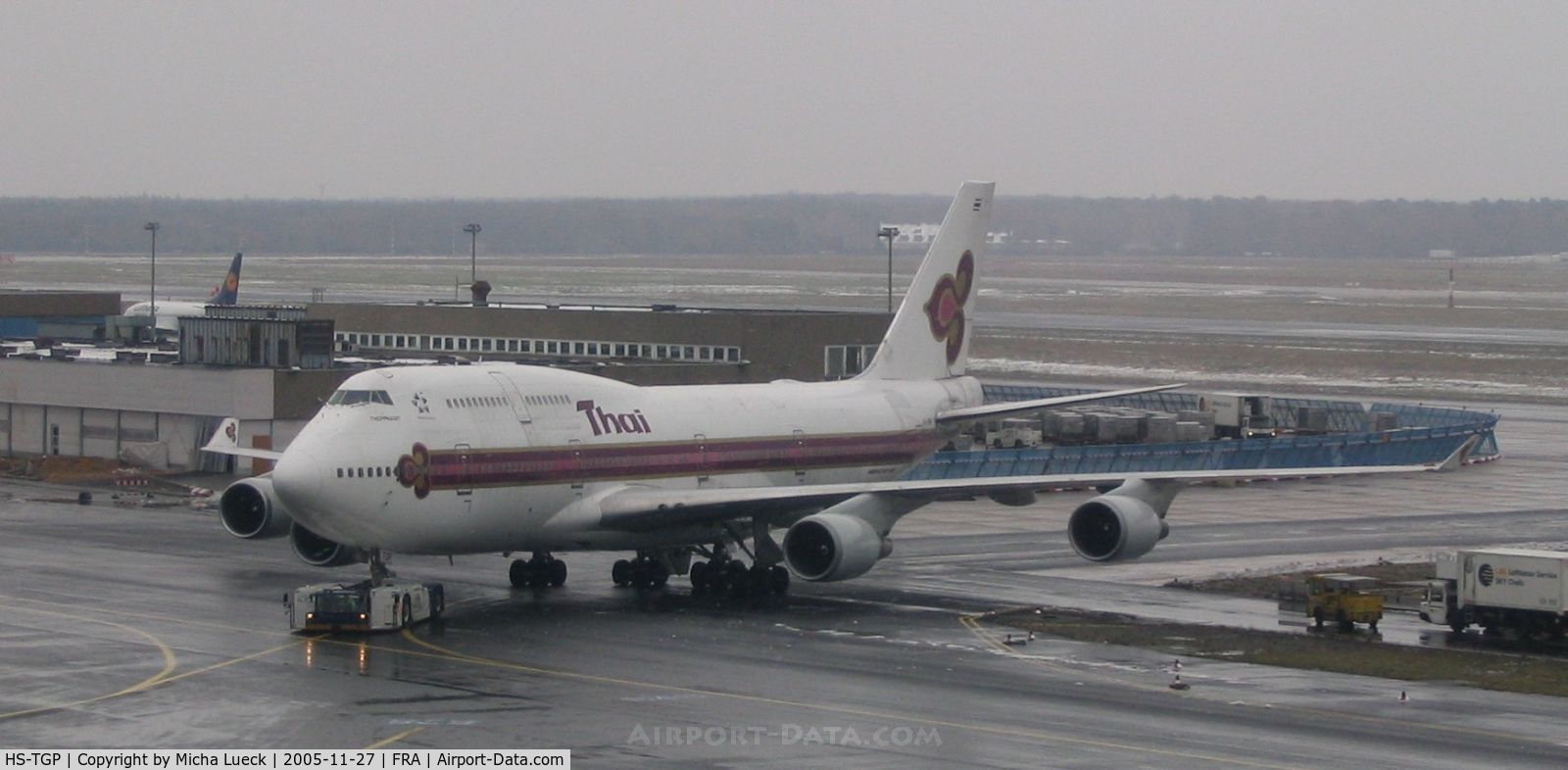HS-TGP, 1994 Boeing 747-4D7 C/N 26610, HS-TGP being towed to the gate