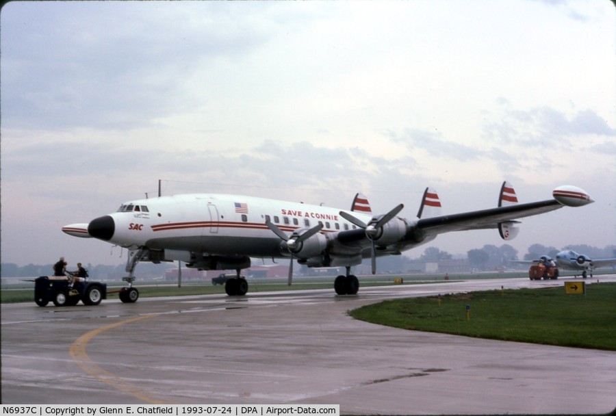 N6937C, 1957 Lockheed L-1049H-82 Super Constellation C/N 4830, Towing out on an early, wet morning