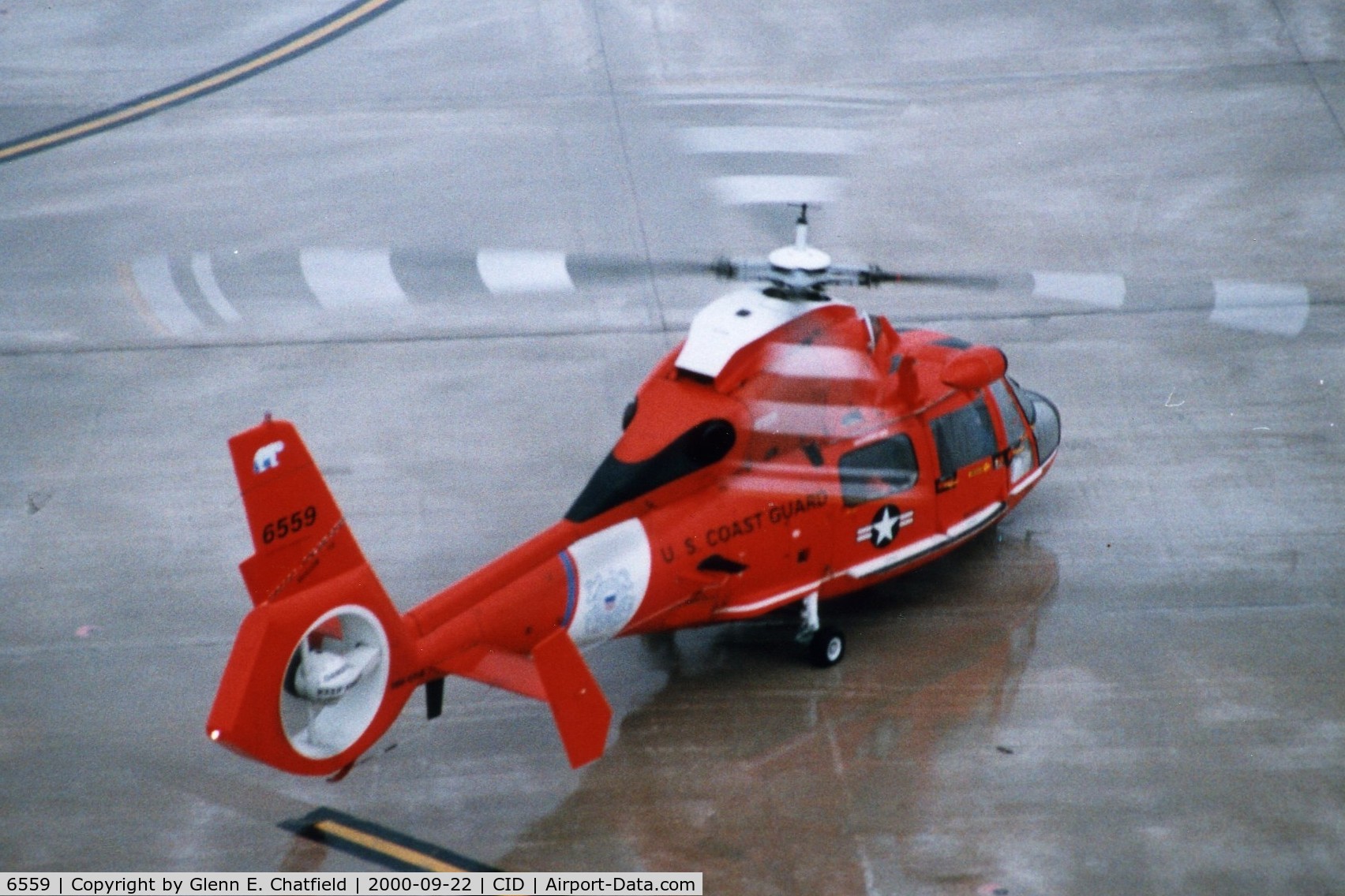 6559, 1987 Aerospatiale HH-65C Dolphin C/N 6241, HH-65B below the control tower - a quick stop in and out