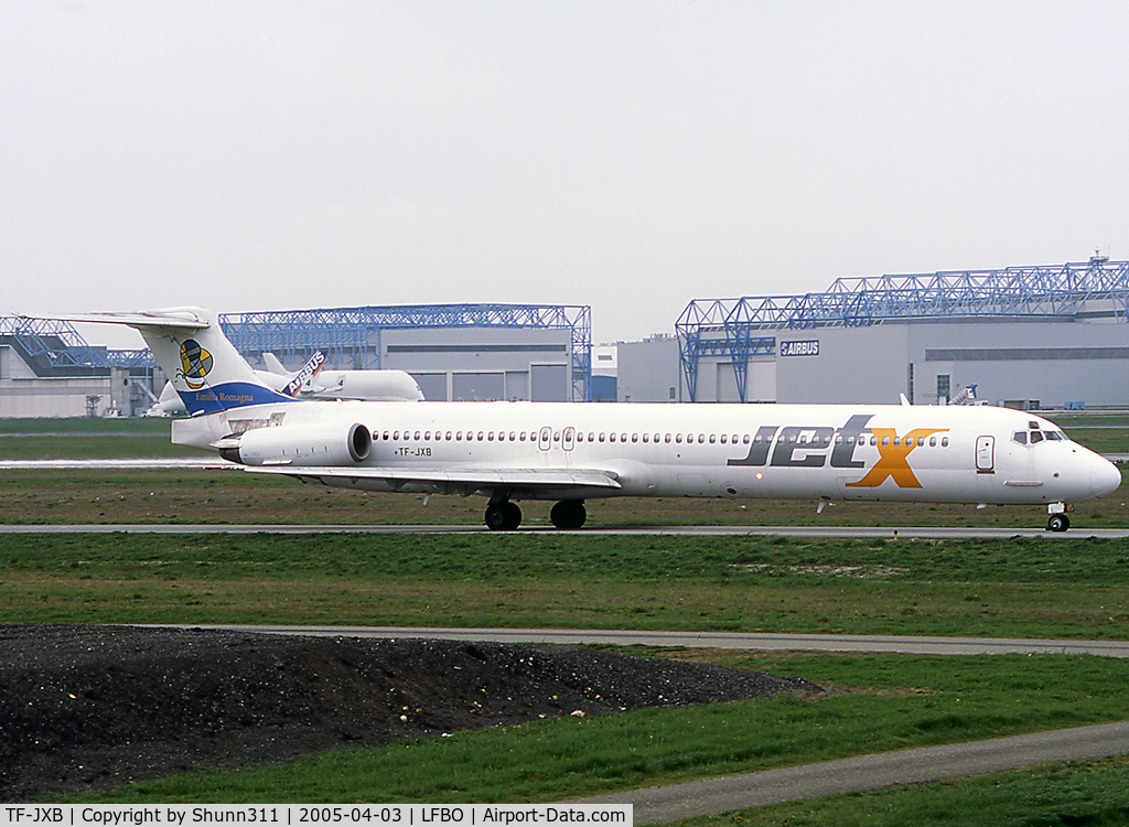 TF-JXB, 1989 McDonnell Douglas MD-82 (DC-9-82) C/N 49909, Rolling holding point rwy 14L for departure... EAL flight this day...