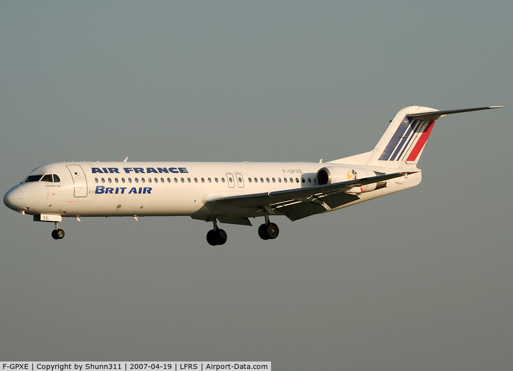 F-GPXE, 1995 Fokker 100 (F-28-0100) C/N 11495, On landing in the late afternoon...