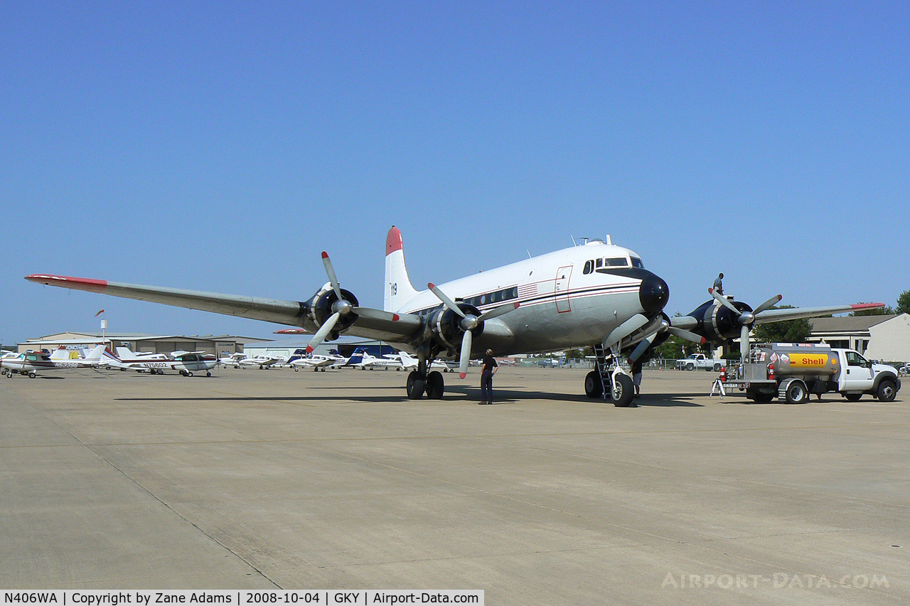 N406WA, Douglas C-54G (DC4-ME2) Skymaster C/N DO338, In for a short fuel stop at Arlington Municipal during a cross country trip from Reno to Miami. USAAF SN  45-0491
