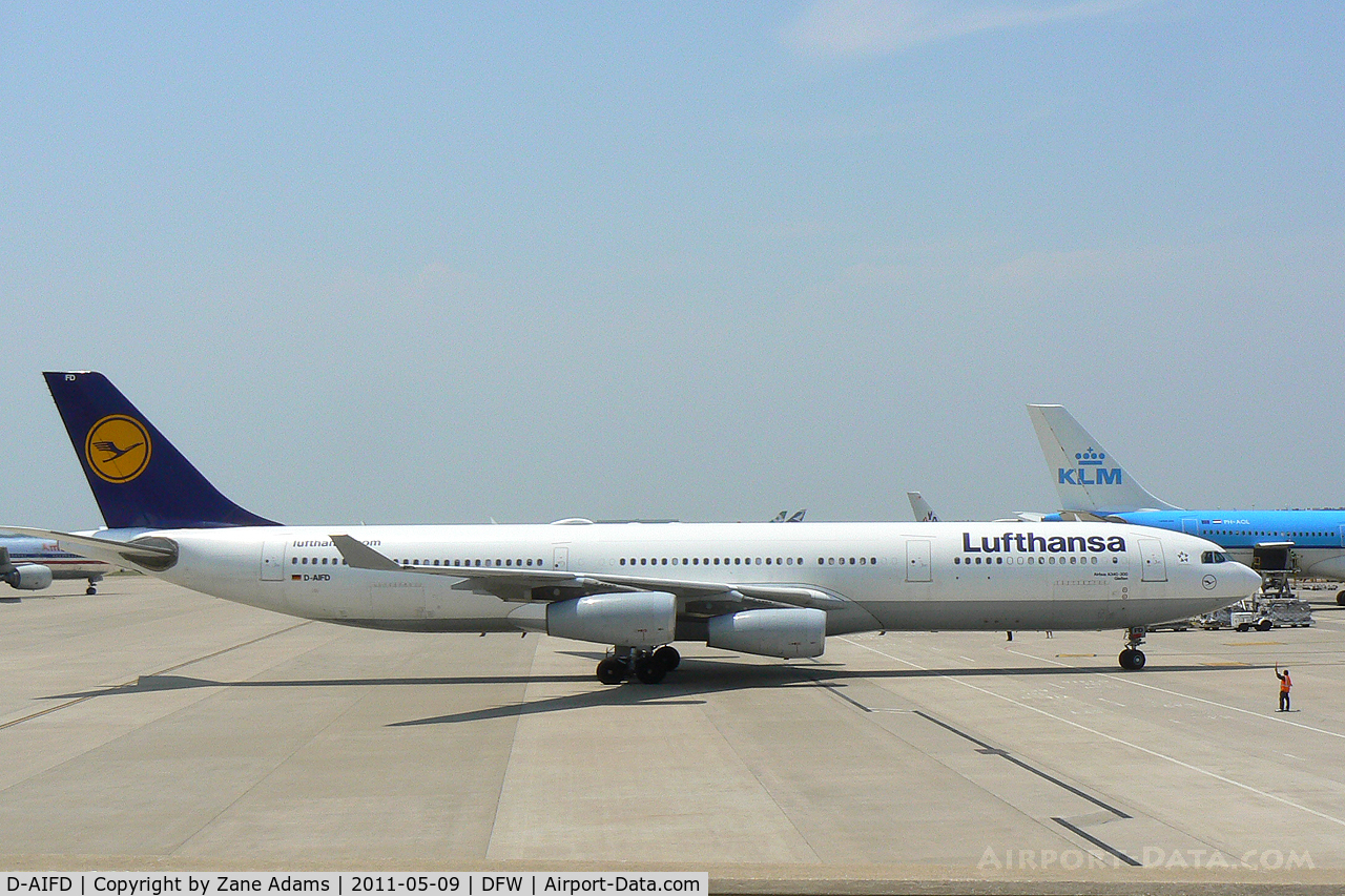 D-AIFD, 2001 Airbus A340-313X C/N 390, Lufthansa A340 arriving at the gate - DFW Airport, TX