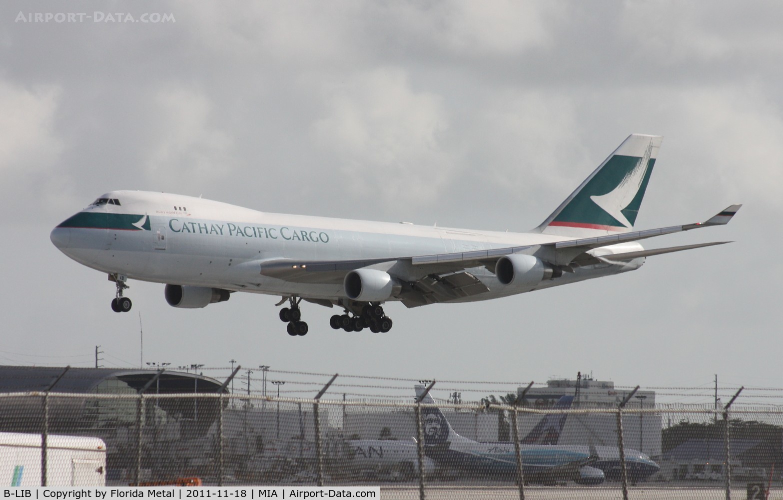 B-LIB, 2008 Boeing 747-467ERF C/N 36867, Windshift brought Cathay Cargo in on Runway 30.  I had 10 min to get from photo holes to 94th Aero Squadron, The traffic red lights around MIA last nearly 10 min so I might have violated a few traffic laws to make it