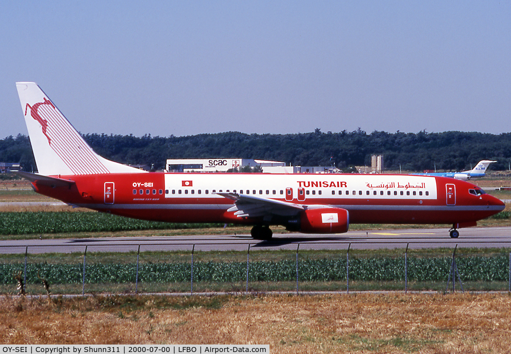 OY-SEI, 1999 Boeing 737-85H C/N 29445, Taxiing holding point rwy 14L for departure... Tunisair summer lease 2000...