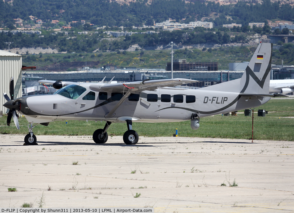 D-FLIP, 1993 Cessna 208B Grand Caravan C/N 208B0331, Parked at Boussiron area...