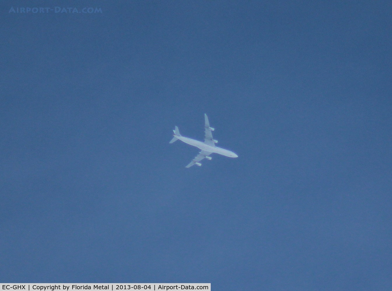 EC-GHX, 1996 Airbus A340-313 C/N 134, Iberia A340-300 overflying Livonia Michigan at 32,000 ft ORD-MAD