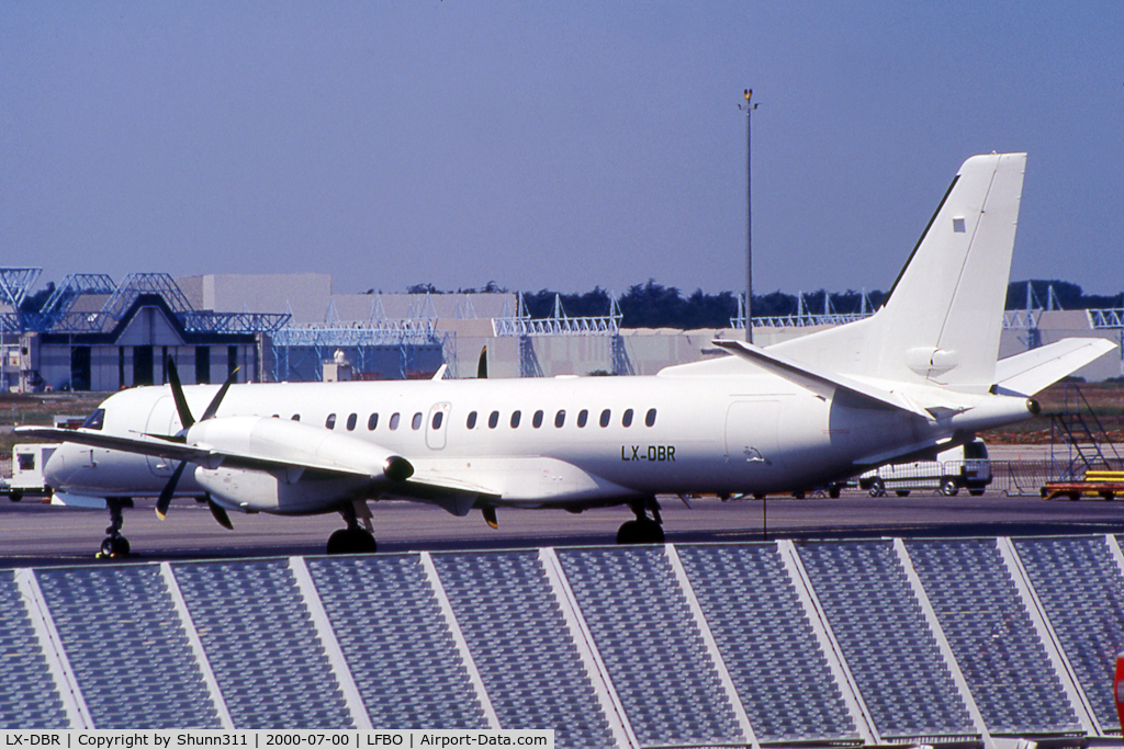 LX-DBR, 1995 Saab 2000 C/N 2000-017, Parked at the General Aviation area in all white c/s without titles... Op by Regional Airlines
