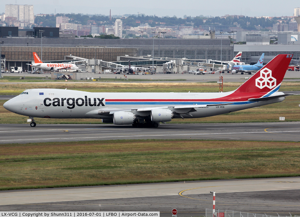 LX-VCG, 2012 Boeing 747-8R7F C/N 35812, Taxiing to the Airport after landing...
