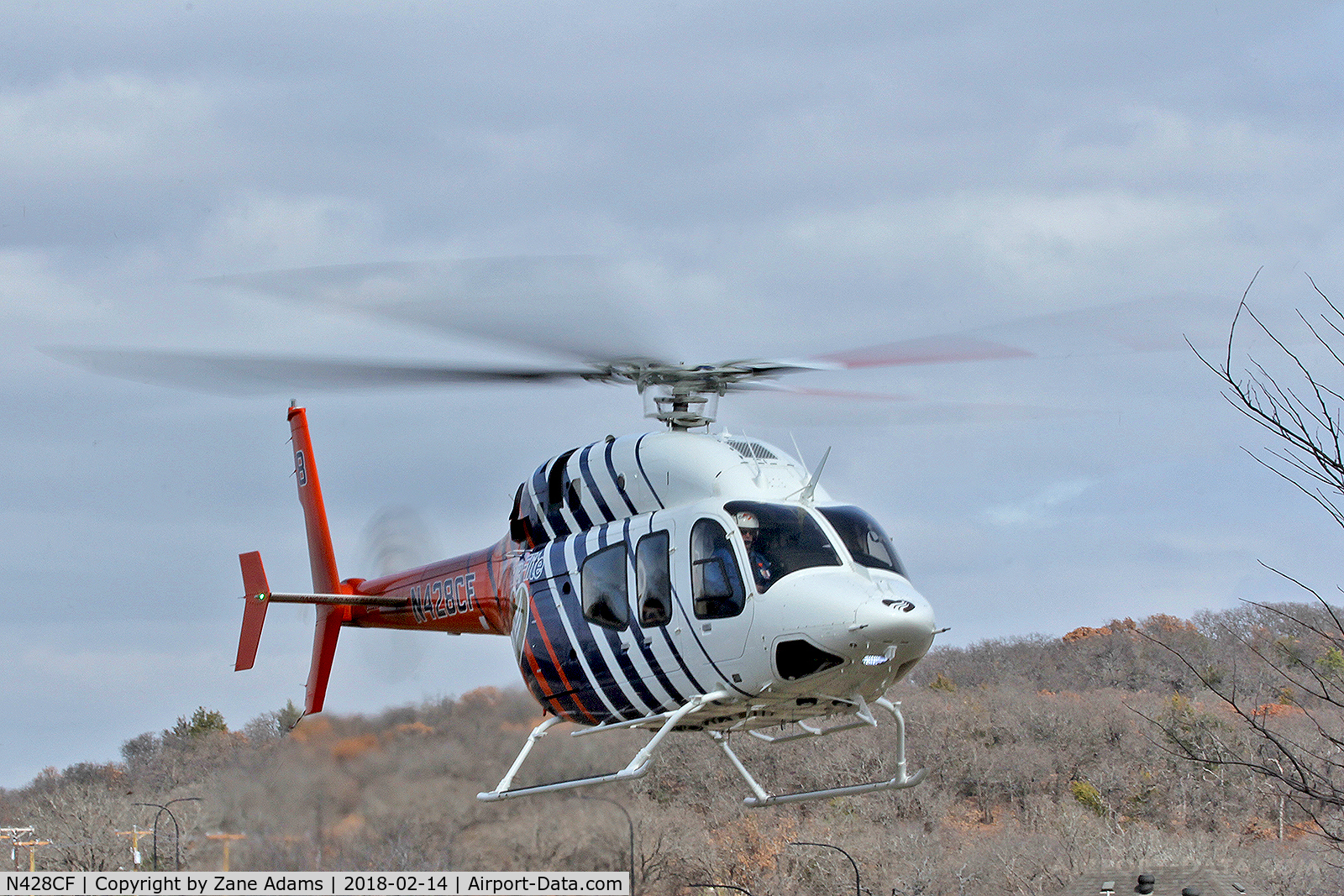 N428CF, 2014 Bell 429 GlobalRanger C/N 57228, CareFlite departing vacant lot in Kennedale, TX
