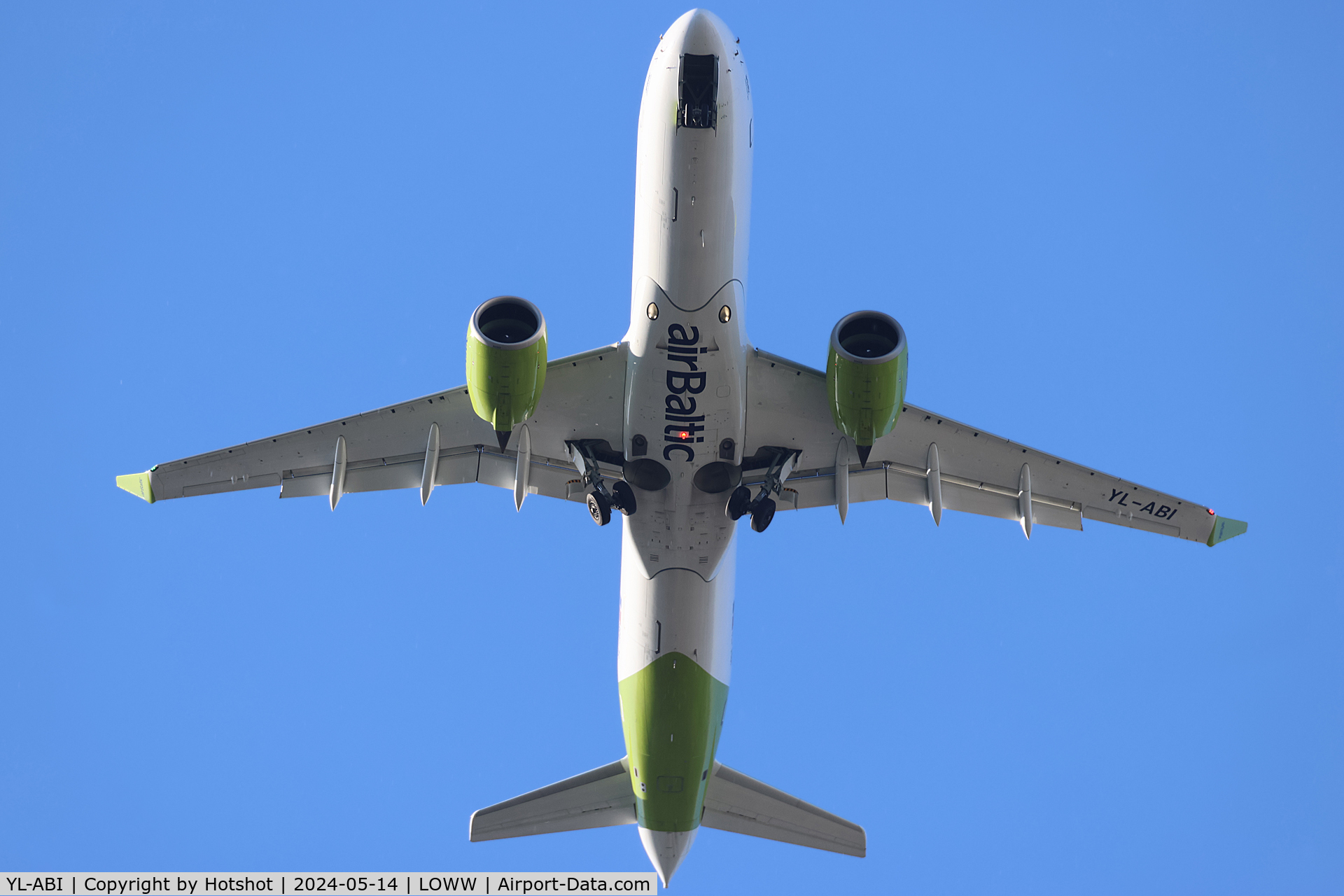 YL-ABI, 2022 Airbus Canada A220-300 C/N 55163, Extending gear and flashing the beacon almost overhead