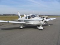 N7064W @ KBTR - 1962 PA28-180 Piper Cherokee - by Kerri Avara