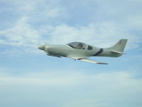 N32KT @ 2M8 - In flight over Memphis - by Gene Whittington