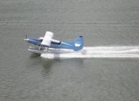 N336AK @ 5Z1 - Taking off from the harbor at Juneau, Alaska.