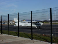 N87GV @ KLUK - CHOCKED UP AT LUK TERMINAL - by J. CARPENTER