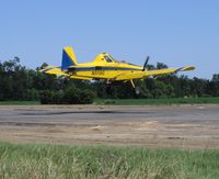 N5119G @ 69CL - Growers Air Service 1997 Air Tractor AT-502B landing during rice seeding flights - by Steve Nation