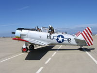 N86WW @ MER - Tailwind Aviation's SNJ-4 painted as USAAF Code HL-B w/red tail stripes - by Steve Nation