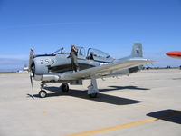 N9022N @ MER - pilot of T-28C 140666 VT-6 F/253 on cellphone (!) @ West Coast Formation Clinic - by Steve Nation