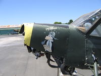 N4584 @ MCE - 1944 Stinson L-5 (44-99497) Unarmed and Unafraid nose art undergoing restoration at Merced, CA - by Steve Nation