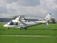 N109KH - Agusta 109 sitting in the sunshine at Sywell - by Simon Palmer