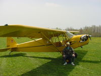 N22EF @ N41 - J3 on grass field - by Brian Peck