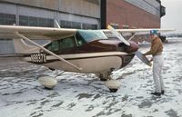 N8837X @ AKR - 37X Preflight at Akron Municipal Airport February 1967 - by Larry Lushbaugh