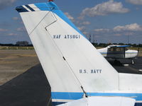 N49397 @ 0O5 - close-up of 1977 Cessna 152 painted with NAF Atsugi (Japan) titles at University Airport, Davis, CA - by Steve Nation