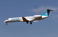 LX-LGX @ LHR - Luxair Embraer ERJ-145 (LX-LGX) landing at London (Heathrow) Airport in August 2004 - by Adrian Pingstone
