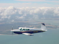VH-MYV @ YBRK - Flying over the Capricorn Coast Queensland. Michael Keating of Rockhampton the new owner and pilot - by Nicholas Keating