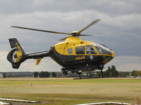 G-WCAO - Eurocopter EC135T, shared by the police forces of Avon and Somerset, and Gloucestershire, built 2001, photographed at the Heli-Day, Kemble, England, in August 2003