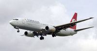 TC-JFN @ LHR - Turkish Airlines Boeing 737-800 (TC-JFN) on the approach to London (Heathrow) Airport in June 2003 - by Adrian Pingstone