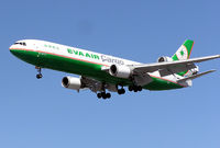 B-16113 @ LHR - EVA Air Cargo McDonnell Douglas MD11 (B-16113) landing at London (Heathrow) Airport in August 2004. - by Adrian Pingstone
