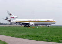 5X-JCR @ LGW - DAS Air Cargo DC-10-30 (5X-JCR) waiting for permission to take off at Gatwick Airport, England in July 2004
