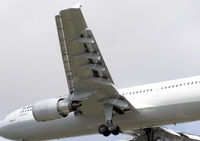 D-AIAH @ LHR - The wing of a Lufthansa Airbus A300B4-600 (D-AIAH) landing at London Heathrow Airport, England. July 2004 - by Adrian Pingstone