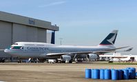 B-HUD @ LHR - Cathay Pacific Boeing 747-400 (B-HUD) in the maintenance area at London (Heathrow) Airport, England in April 2005 - by Adrian Pingstone