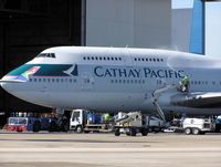B-HUD @ LHR - Cathay Pacific Boeing 747-400 (B-HUD) being cleaned in the maintenance area at London (Heathrow) Airport, England in April 2005 - by Adrian Pingstone
