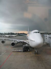 9V-SMW @ SIN - The next tropical rainstorm is looming - by Micha Lueck