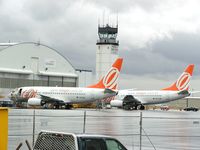 N311ML @ PAE - Two Gol 737-700's awaiting delivery at Paine Field Airport.  They both belong to Seattle based leasing company Bouillioun. - by Andreas Mowinckel