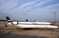 N818CA @ CVG - At the gate in CVG (Concorse C)