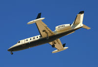 N73CL @ LAS - Wing tanks and winglets, an unusual combination. - by Kevin Murphy