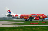 9M-MPD @ EGCC - Malaysia's 'Hibiscus' livered 747 coming to rest on 24R - by Kevin Murphy