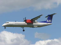 OY-KCH @ KRK - after takeoff