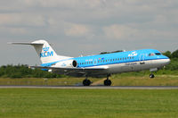 PH-WXD @ EGCC - Smart looking Dutch commuter jet. - by Kevin Murphy