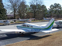 N7951F @ PDK - Tied down @ PDK with vairous AC in background - by Michael Martin